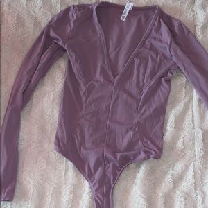 purple thong body suit